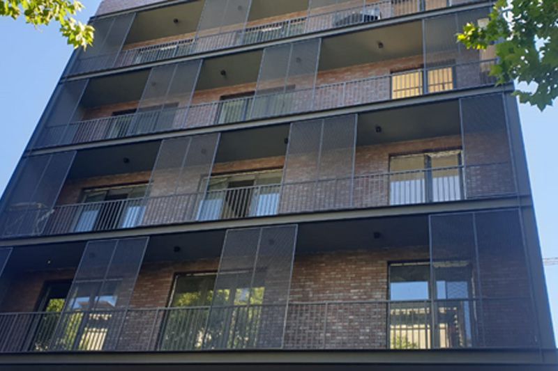 Residential House — Perforated Shutters