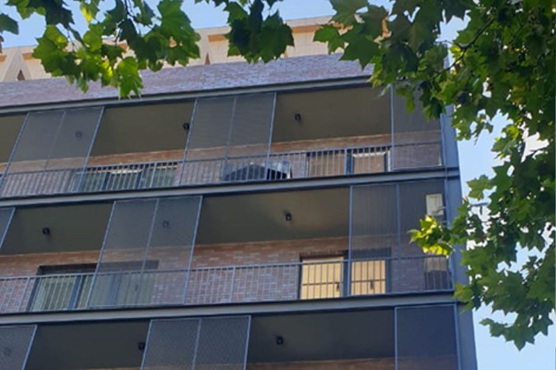 Residential House — Perforated Shutters