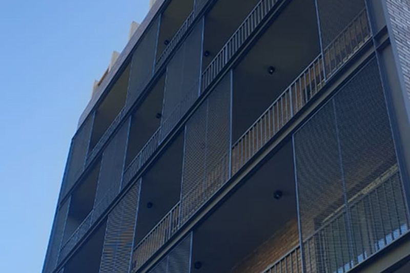 Residential House — Perforated Shutters