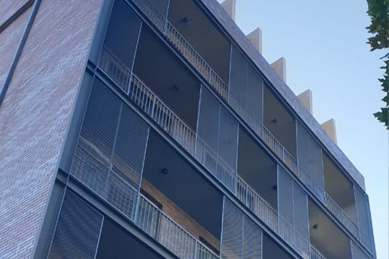 Residential House — Perforated Shutters